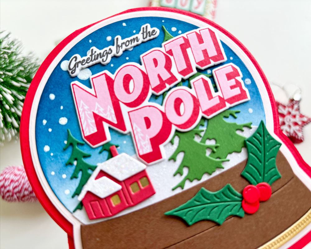 Greetings from the North Pole | Poppy Stamps Cabin Snowglobe